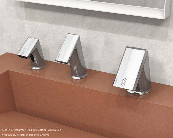 Sloan AER-DEC Sinks with integrated faucet, soap dispenser, and hand faucet. The sink is shown in Arcilla Red and the faucet finish is plated chrome.