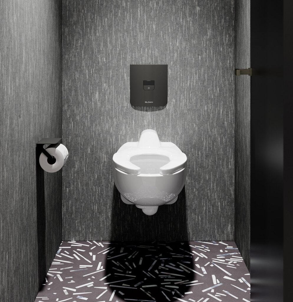 A modern toilet stall featuring Sloan's CX sensor flushometers.
