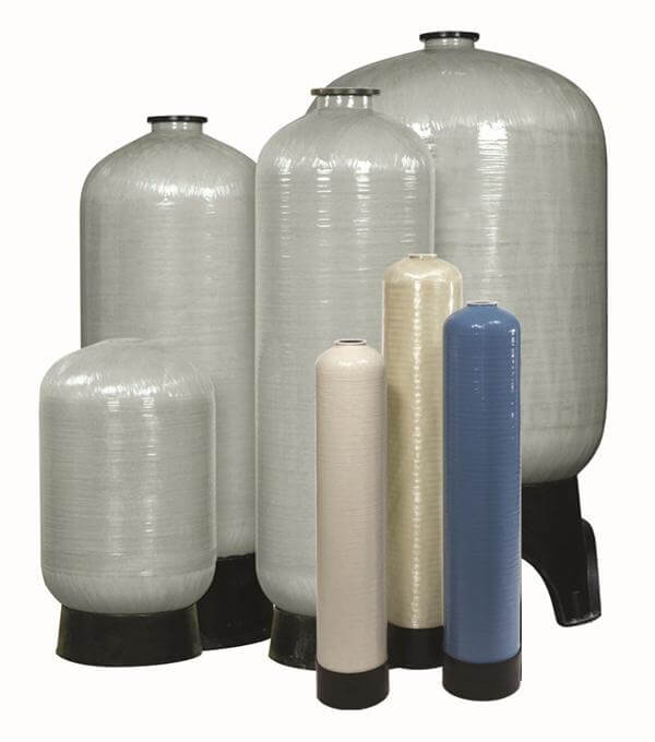 A composite image showing several mineral tanks in various sizes. These are used with water treatment control valves in residential and commercial applications.